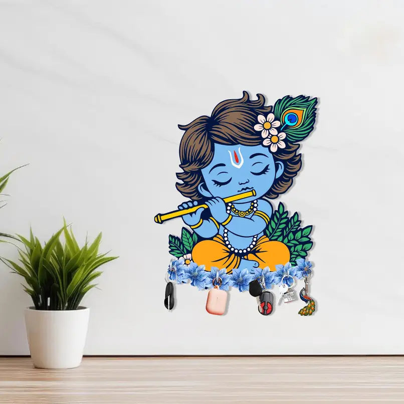 Wall decal of a blue-skinned figure with a flute and peacock feather on a white wall.